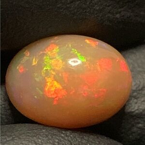 3.62 CT 12X9 MM REDFLASH PATTERN!! RARE TOP QUALITY ETHIOPIAN WELO OPAL